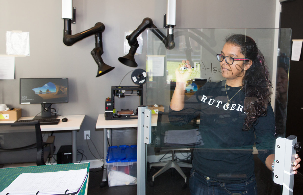 An Honors College student inside the Makerspace room