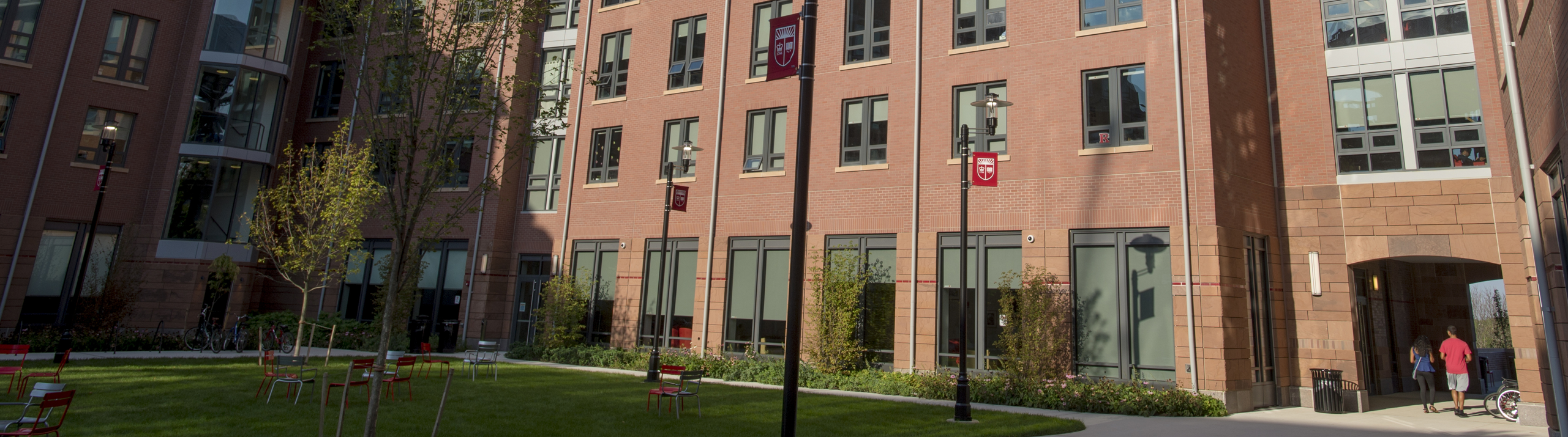 Students walking through the archway