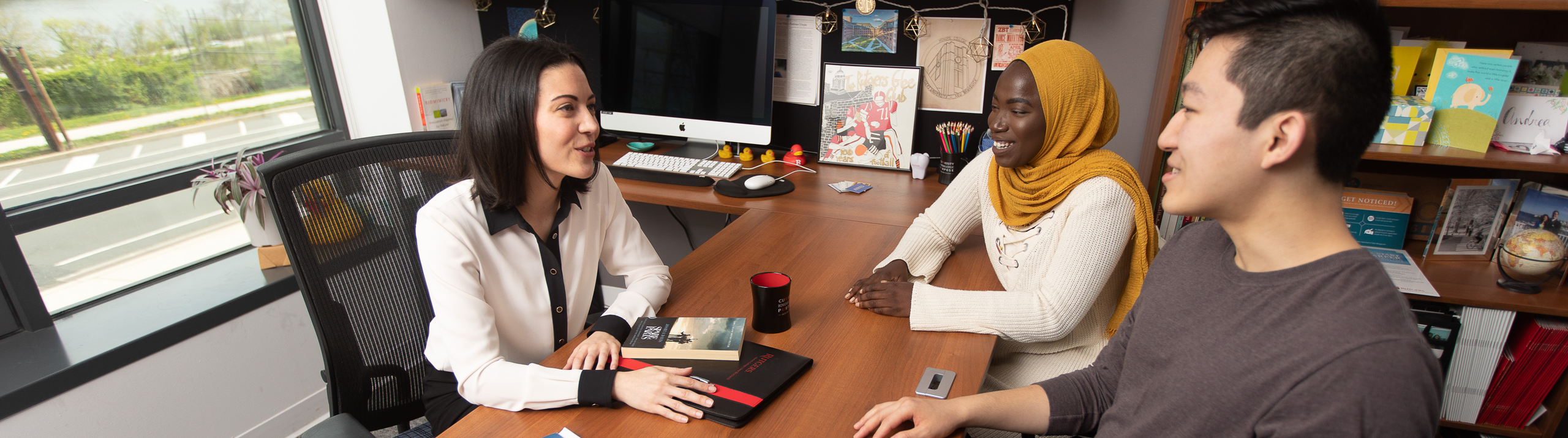Assistant Dean advising students on career options