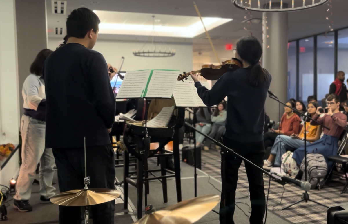 Honors College students performing during a Coffeehouse Event