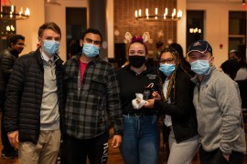 Students in front of fireside lounge