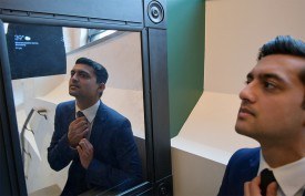 Yash Sanghavi ('19, RBS/HC) in front of the Entractiv smart mirror