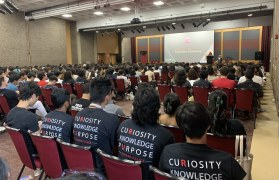 Photo of the Honors College students sitting at the Induction Ceremony