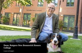 Photo of J.D. Bowers, Dean of the Honors College, with his dog, Makai.