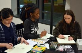 Honors College students drawing during the HC Studio Night Event